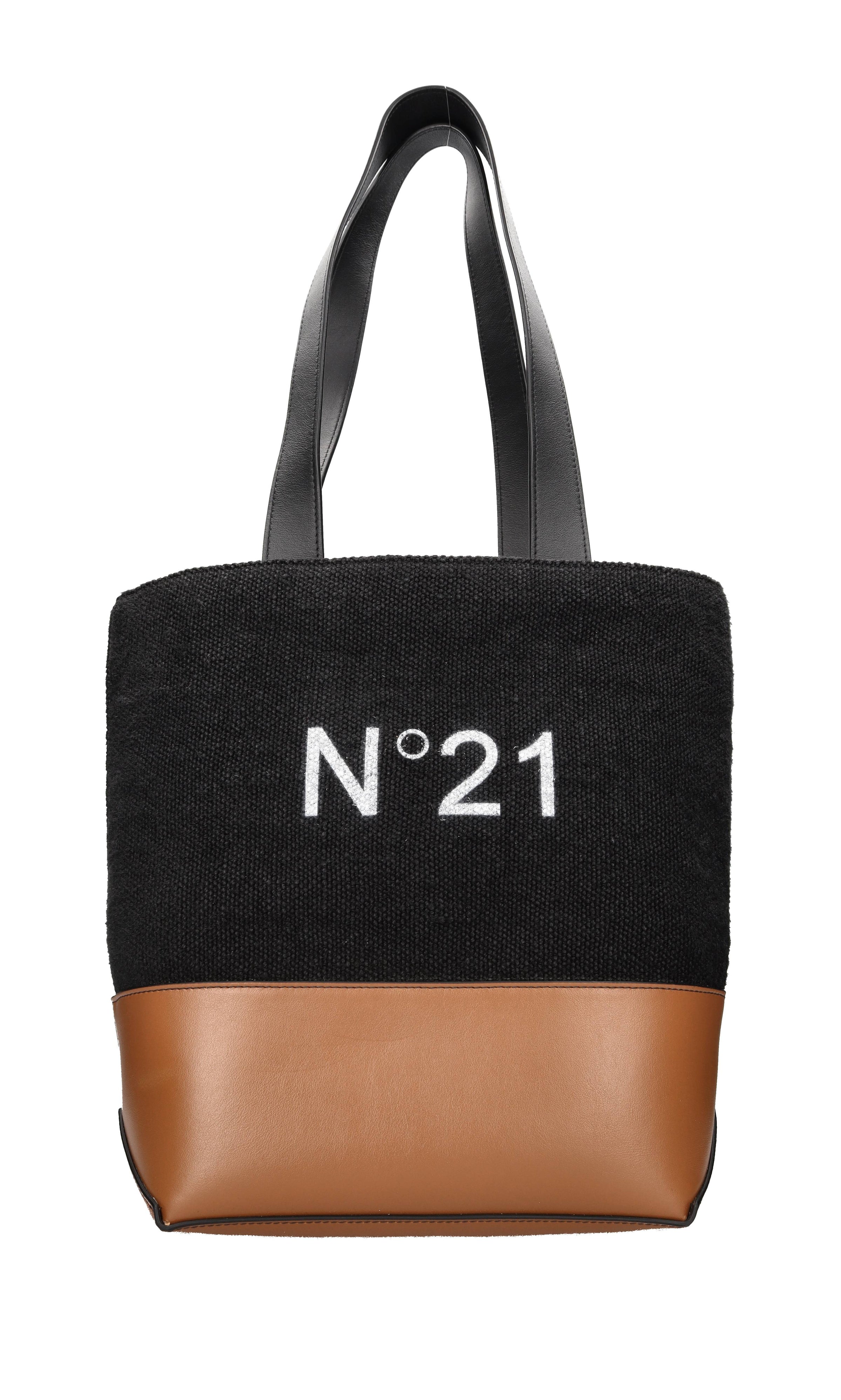 Borsa in pelle e tessuto 