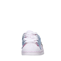 Sneakers in pelle e tessuto 