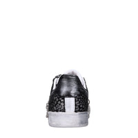 Sneakers in pelle e tessuto 
