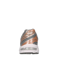 Sneakers in ecopelle e tessuto 