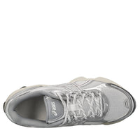 Sneakers in ecopelle e tessuto 