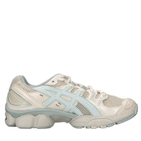 Sneakers in ecopelle e tessuto 