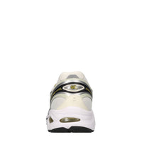 Sneakers in ecopelle e tessuto 
