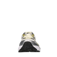 Sneakers in ecopelle e tessuto 