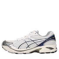 Sneakers in ecopelle e tessuto 