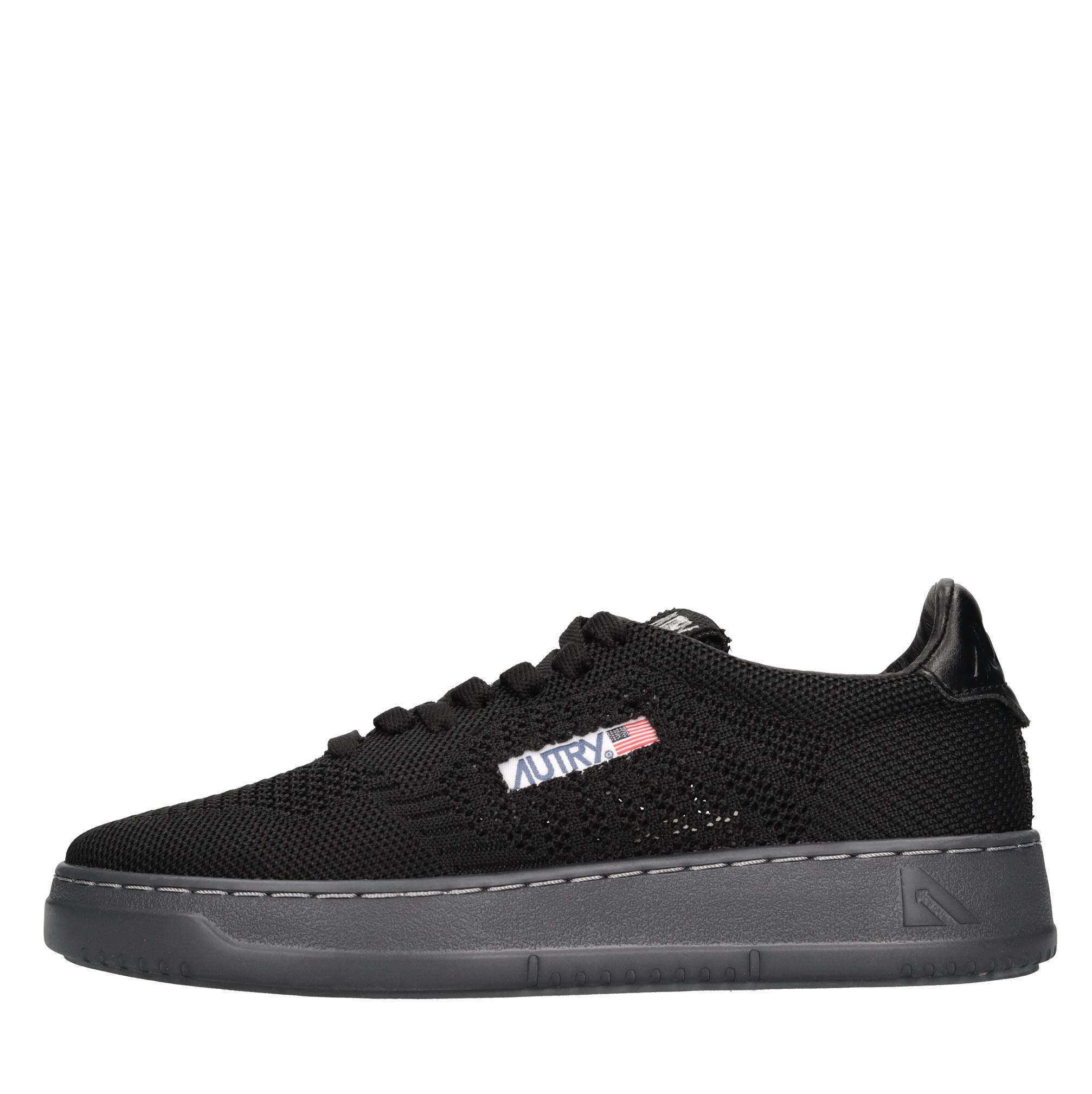 Sneakers in pelle e tessuto 