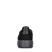 Sneakers in pelle e tessuto 