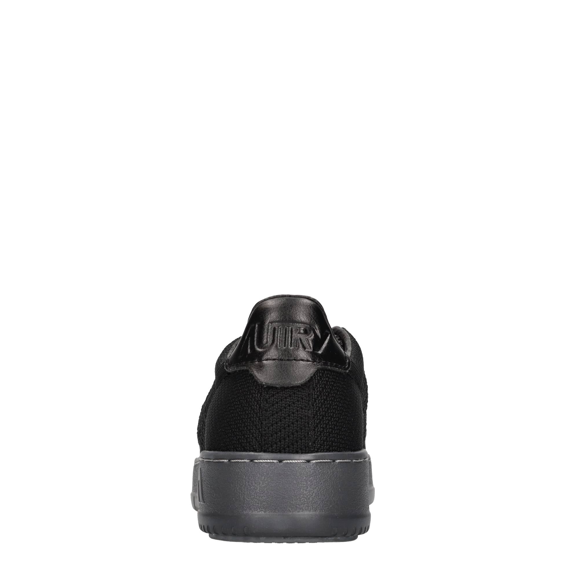 Sneakers in pelle e tessuto 
