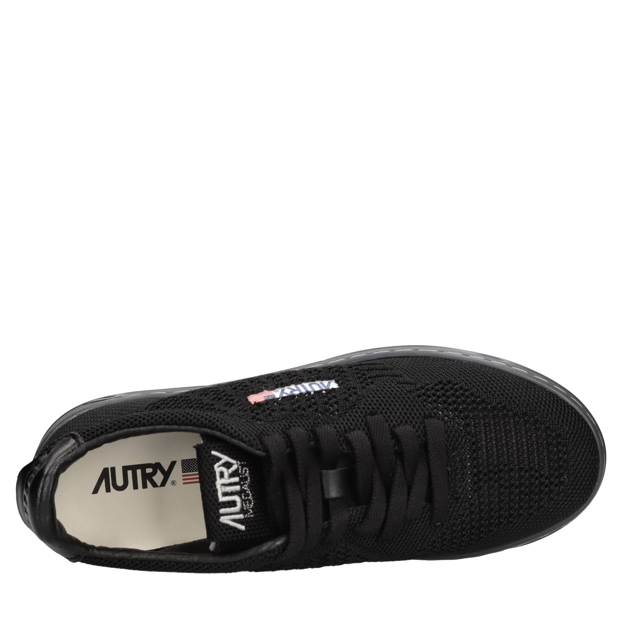 Sneakers in pelle e tessuto 