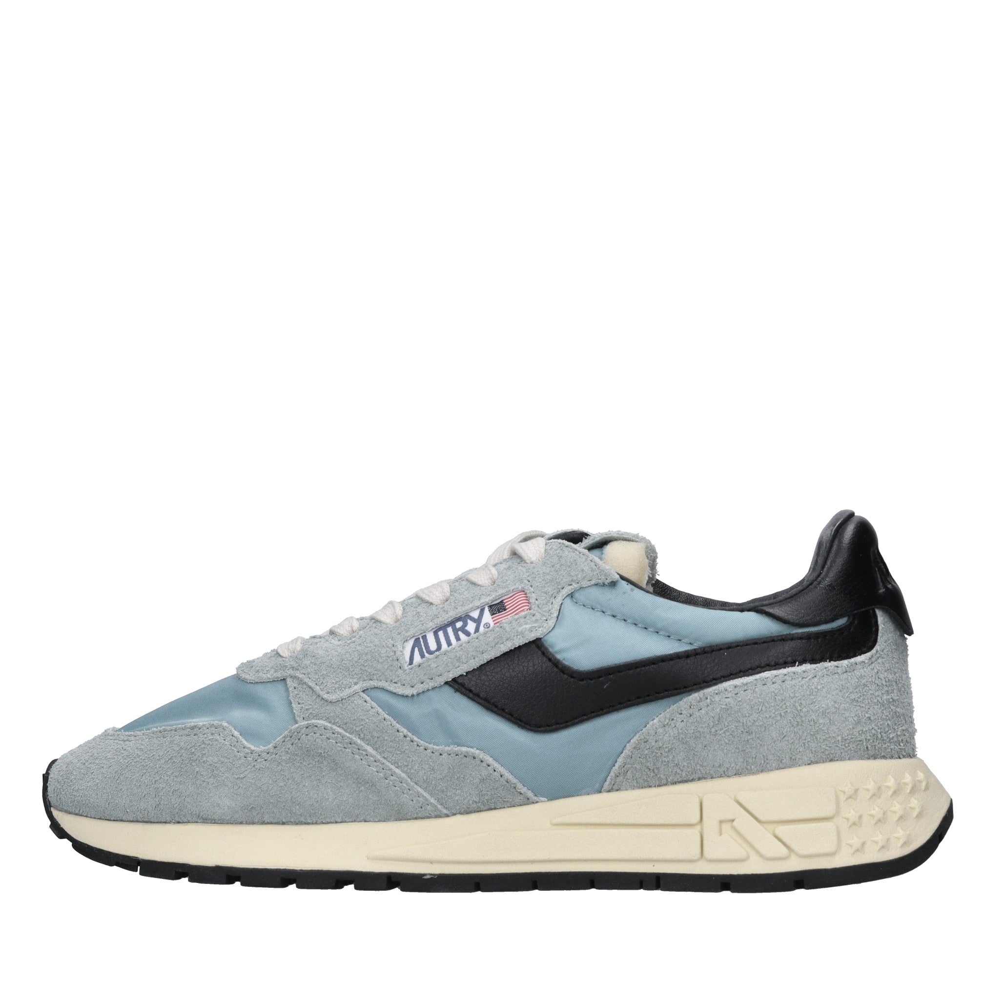 Sneakers in pelle camoscio e tessuto 