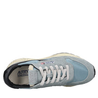 Sneakers in pelle camoscio e tessuto 