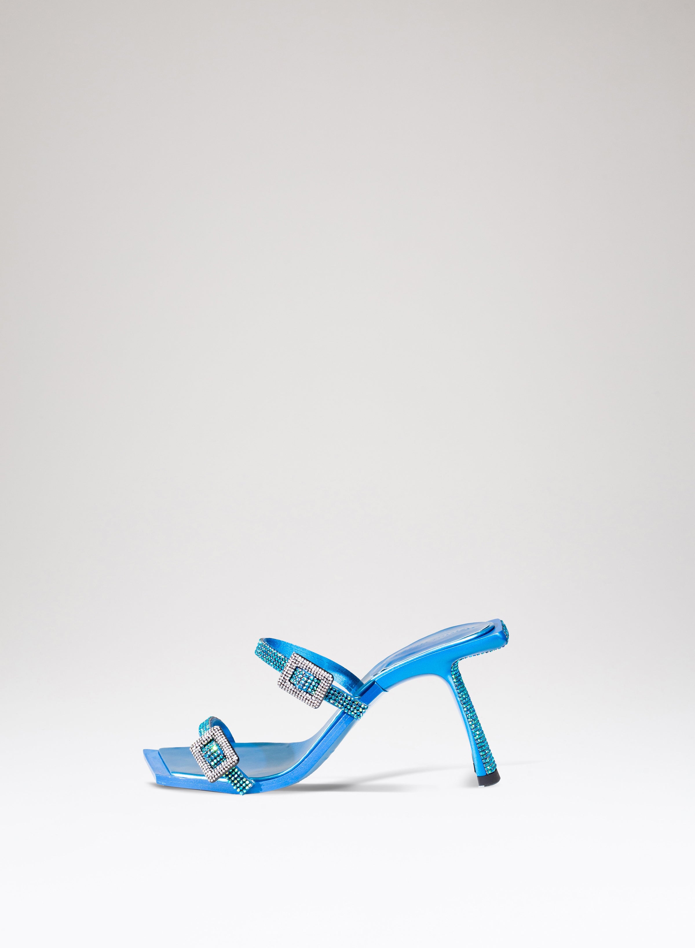 Mules Ewa in pelle tessuto e strass 