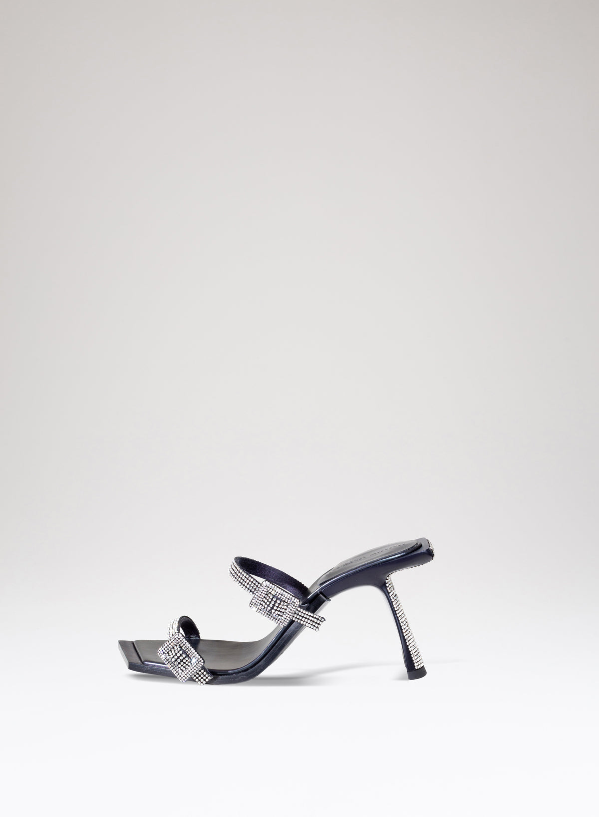 Mules Ewa in pelle tessuto e strass 
