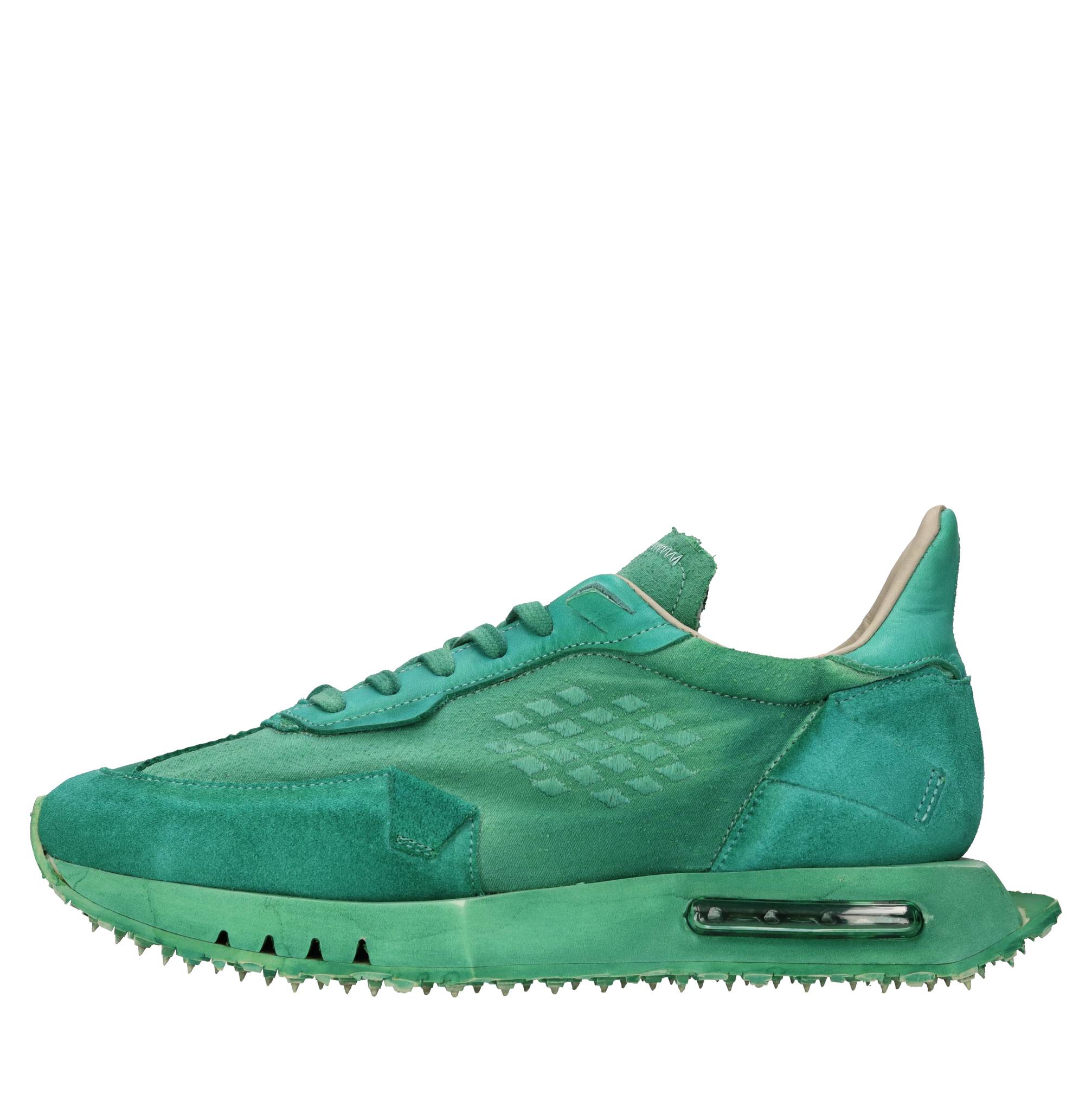 Sneakers in pelle e tessuto 