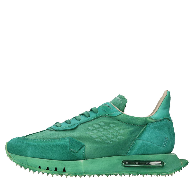 Sneakers in pelle e tessuto 