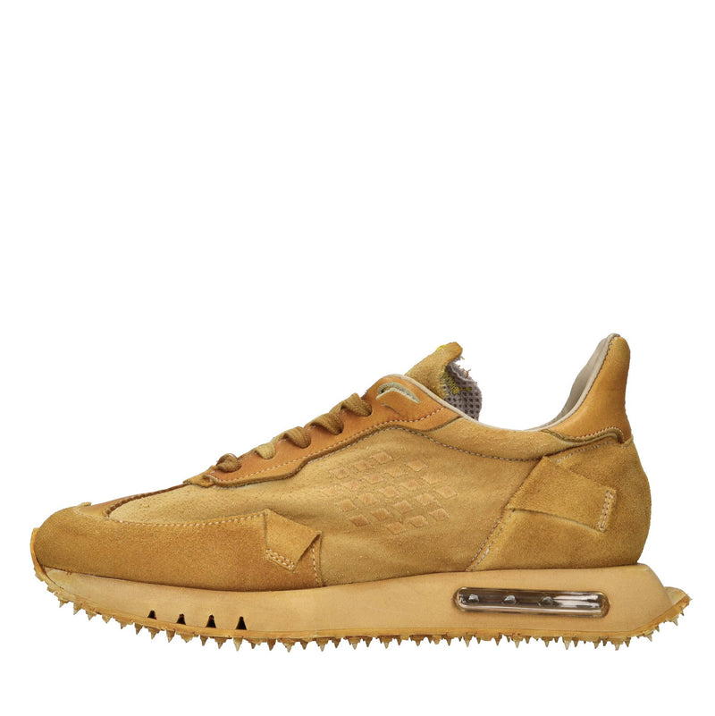 Sneakers in pelle e tessuto 