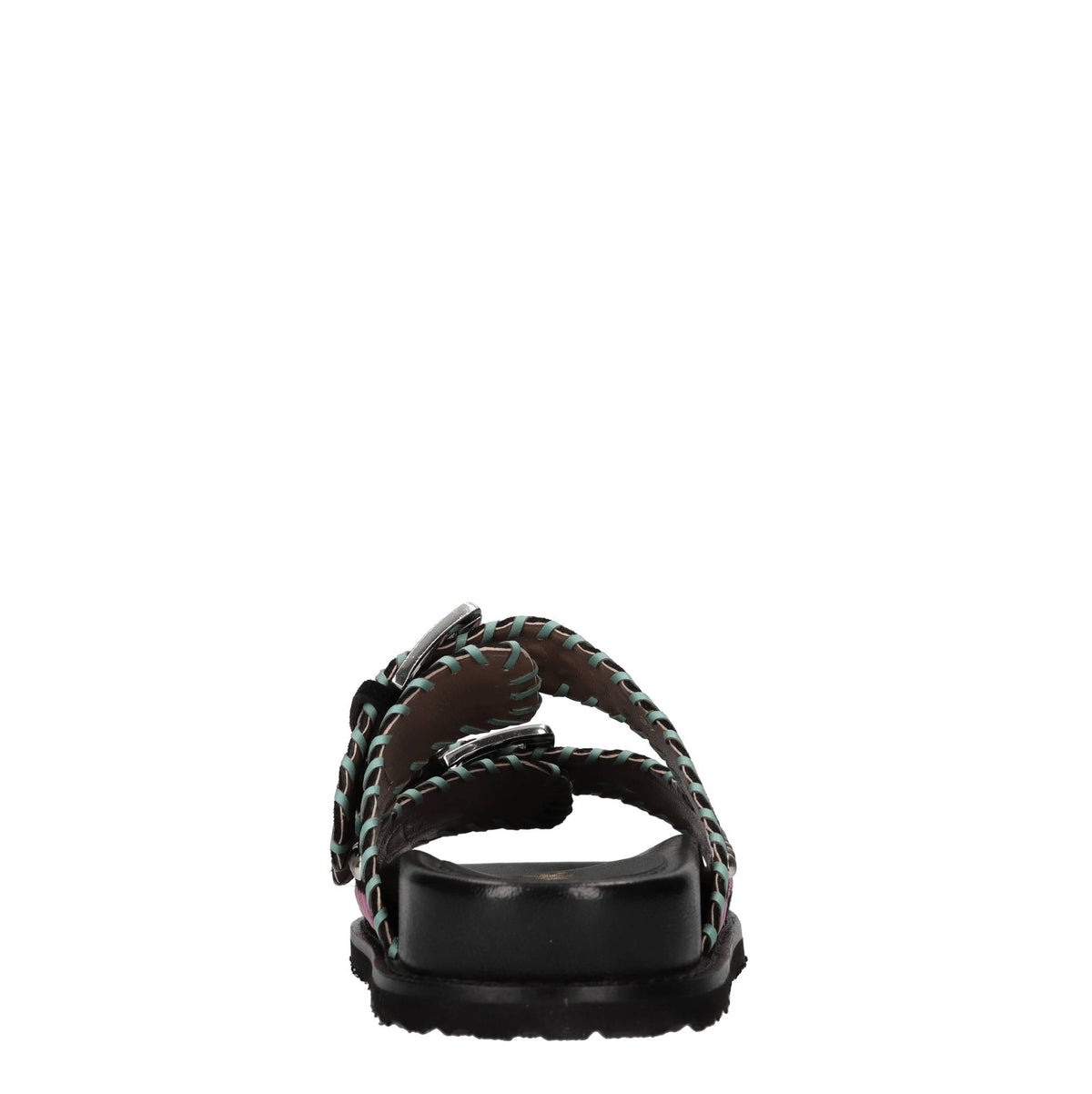 Mules in camoscio e pelle con borchie 