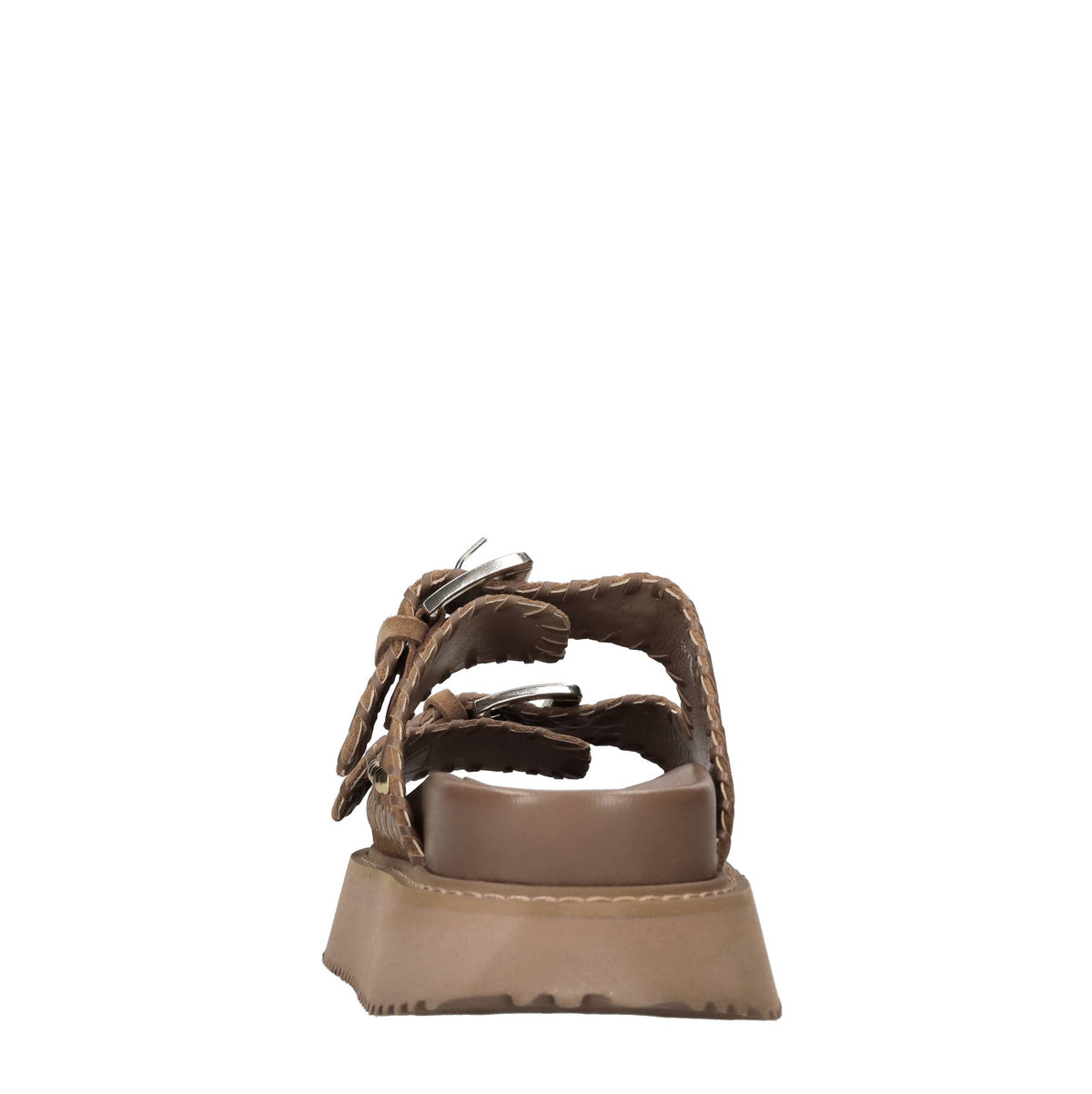 Mules in camoscio e pelle con borchie 