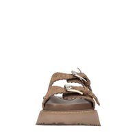 Mules in camoscio e pelle con borchie 