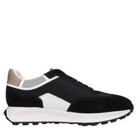 Sneakers in pelle e tessuto. 