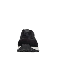 Sneakers in pelle e tessuto. 