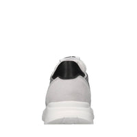 Sneakers in pelle e tessuto 