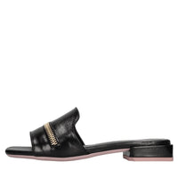 Mules in pelle lucida 