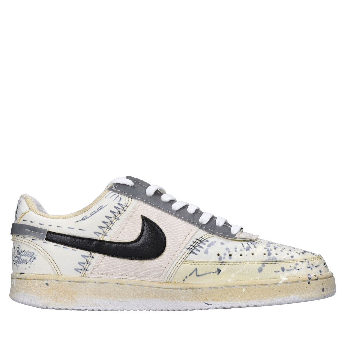 Sneakers in ecopelle e tessuto 