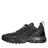 Sneakers in tessuto e materiale sintetico 