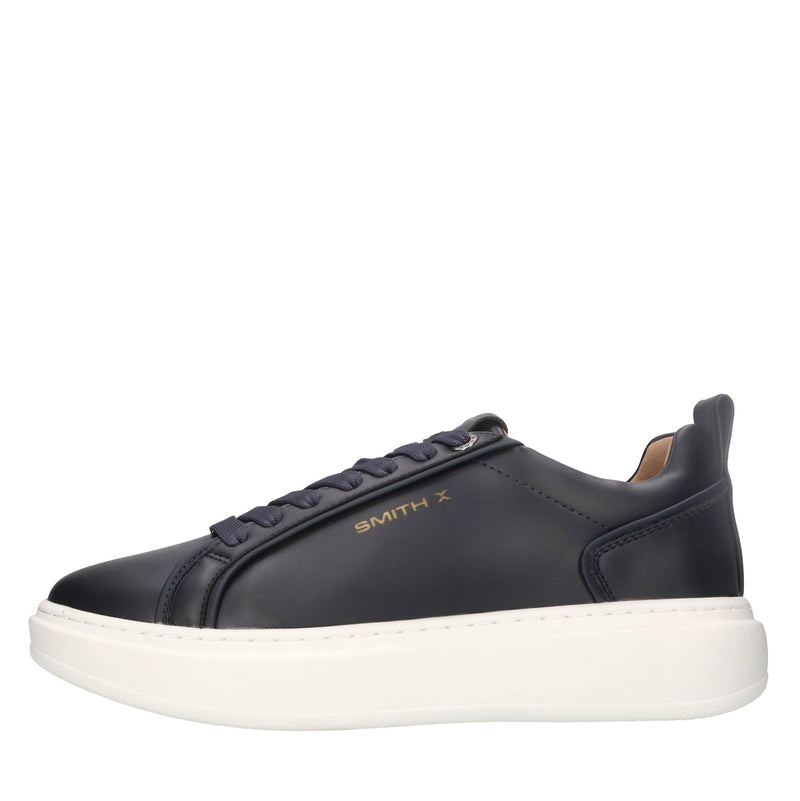 Sneakers in ecopelle e tessuto 
