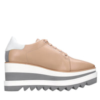 Sneakers in ecopelle e tessuto 