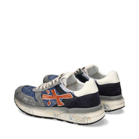 Sneakers in pelle scamosciata, tessuto e inserti in pelle 