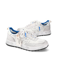 Sneakers in pelle scamosciata, tessuto e inserti in pelle 