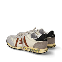 Sneakers in pelle ecopelle e tessuto 
