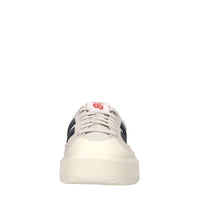 Sneakers in pelle e tessuto 