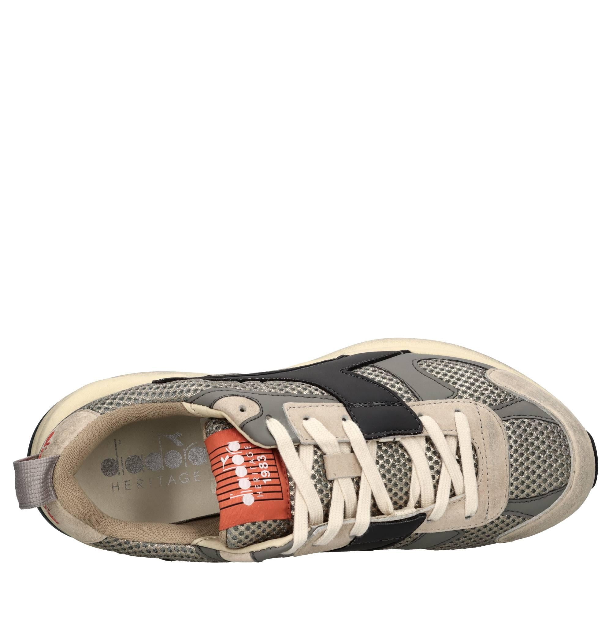 Sneakers in pelle e tessuto 