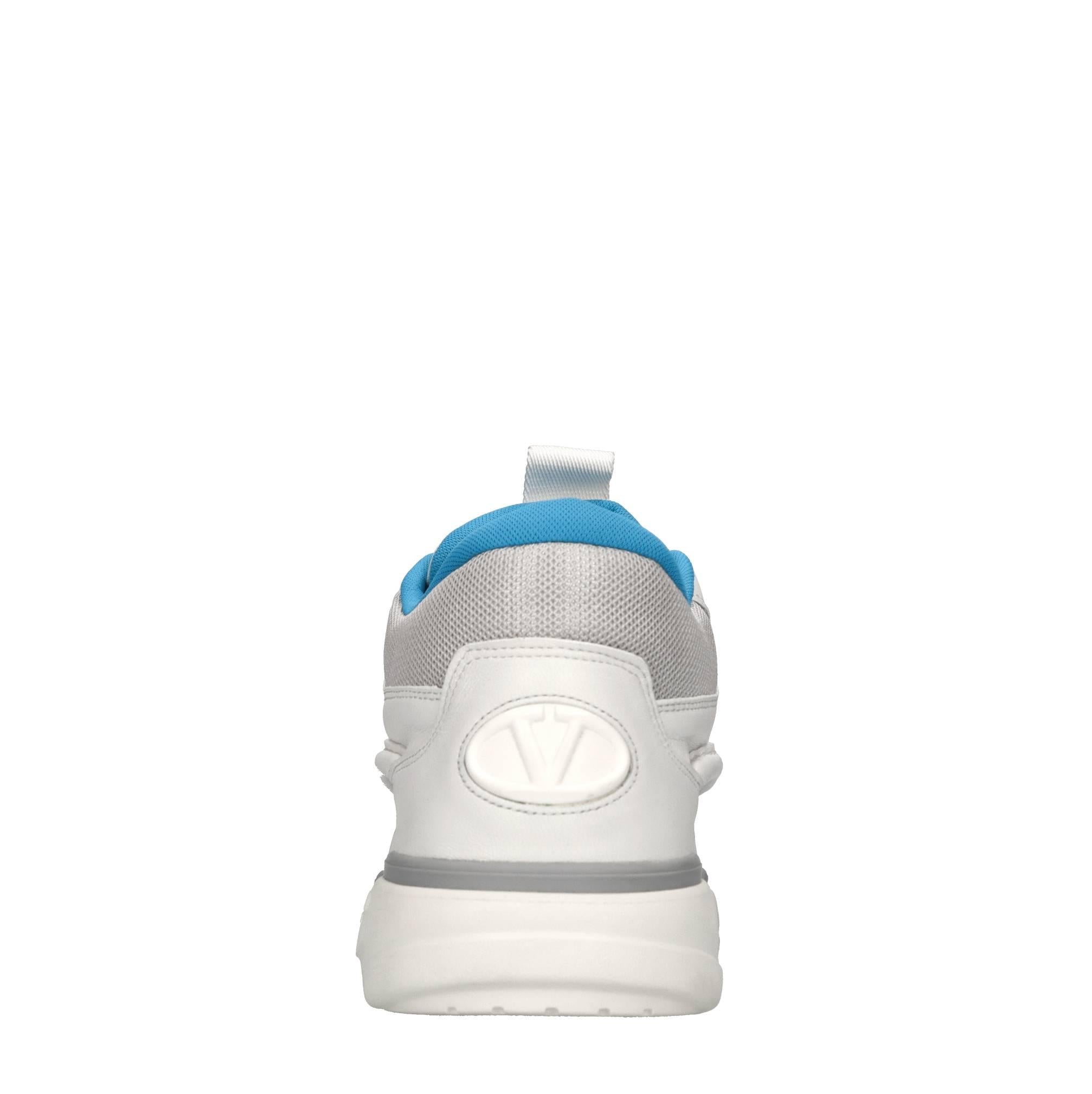 Sneakers in pelle e tessuto 