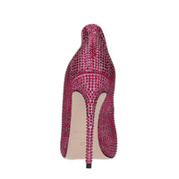 Décolleté in pelle e strass 