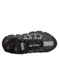 Sneakers in pelle e tessuto 