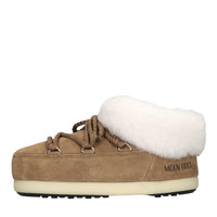 Mules in camoscio e pelliccia 