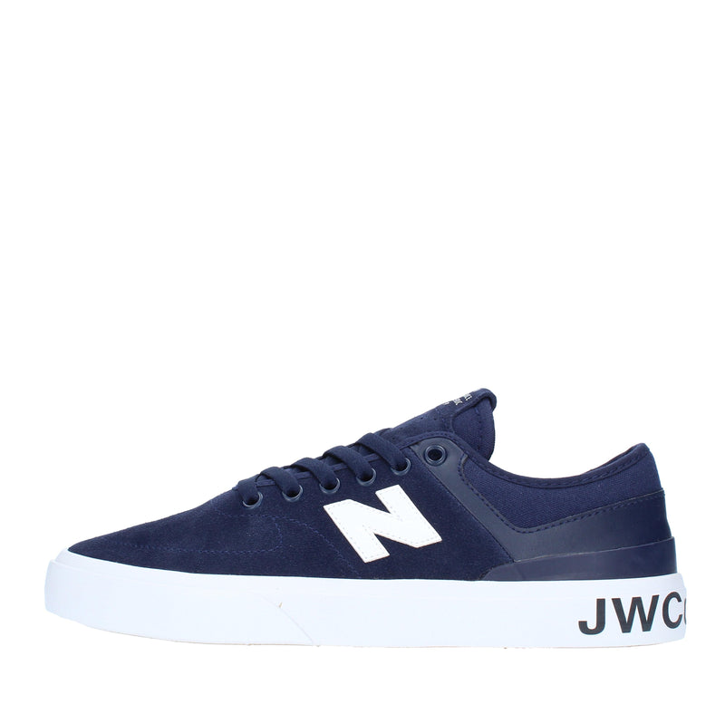 Sneakers in camoscio e tessuto 