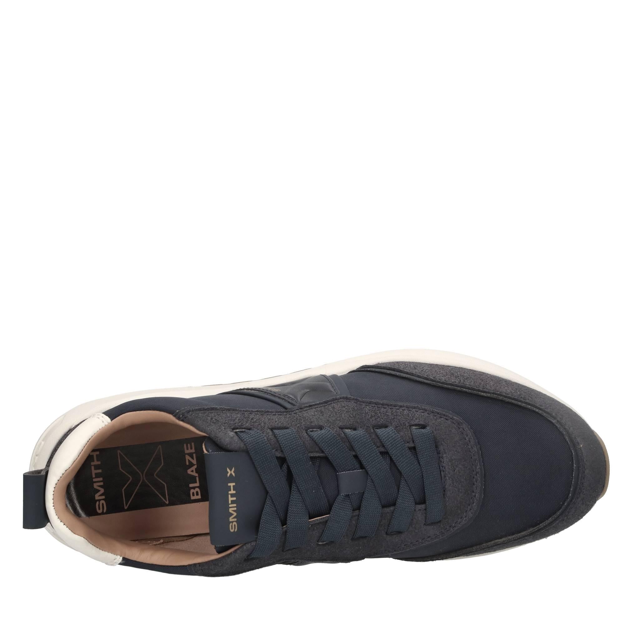 Sneakers in ecopelle e tessuto 