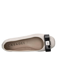 Ballerine in pelle con fiocco in vernice 
