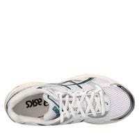 Sneakers in ecopelle e tessuto 