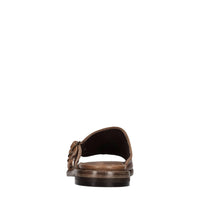 Mules flat in pelle 