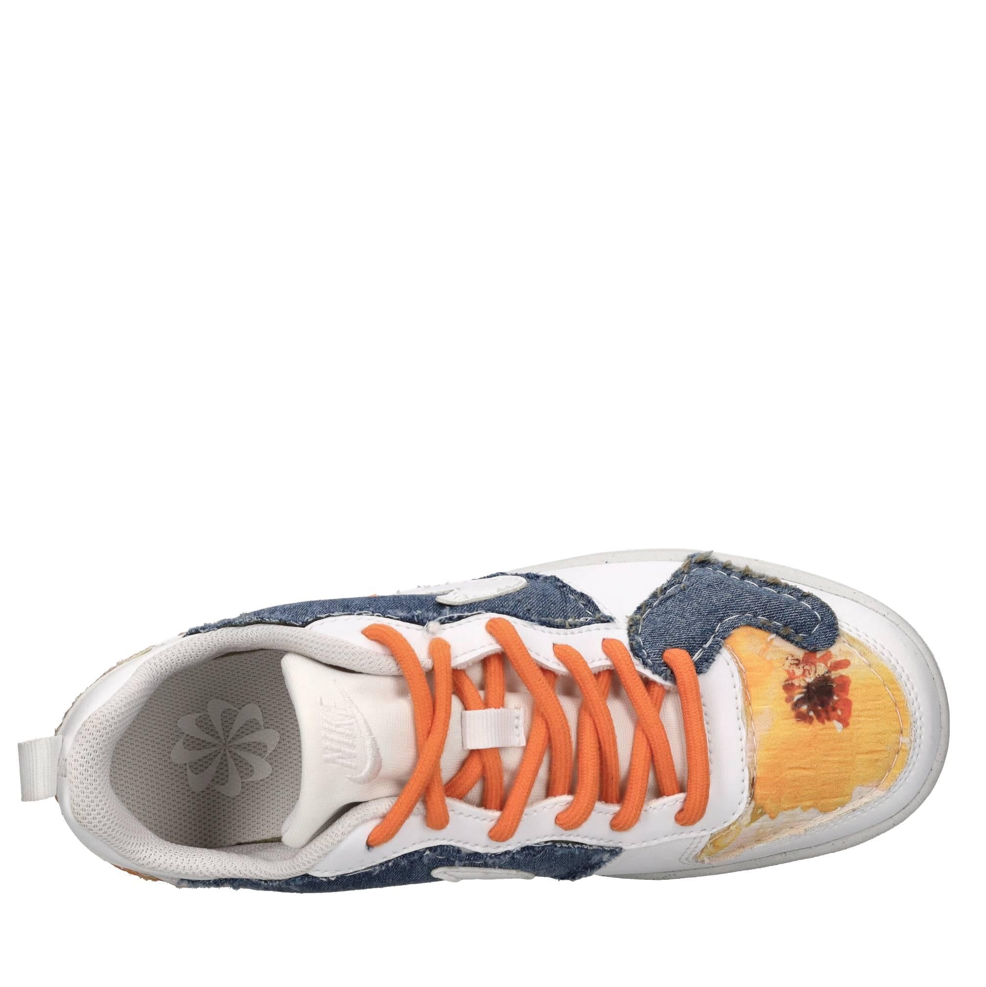 Sneakers in pelle e tessuto 
