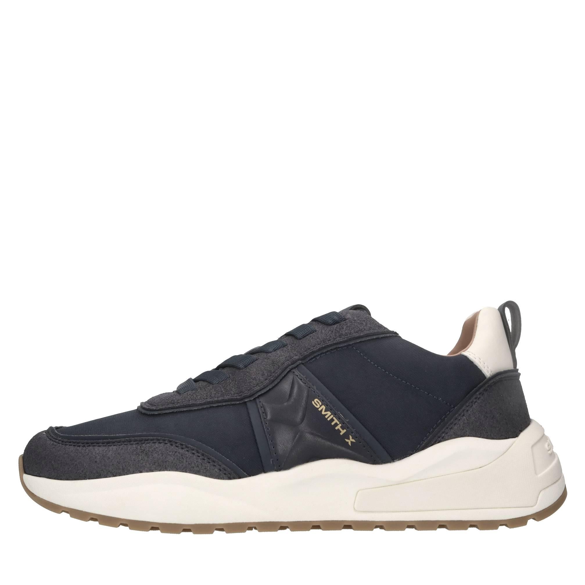 Sneakers in ecopelle e tessuto 