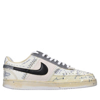 Sneakers in ecopelle e tessuto 