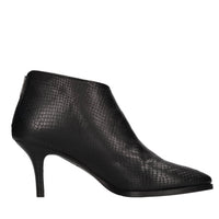 Tronchetti Hadid in pelle 