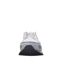 Sneakers in pelle e tessuto 